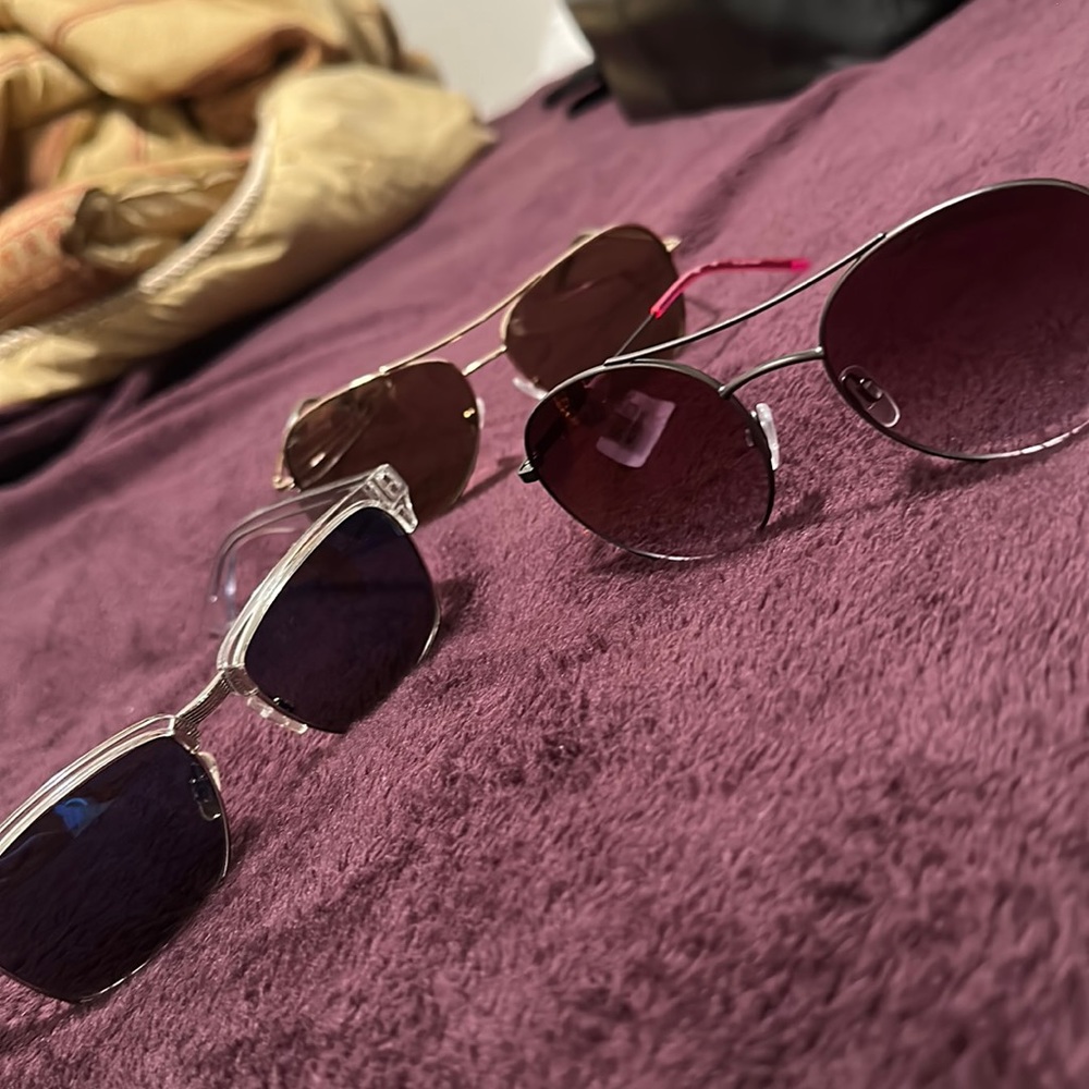 3 pairs of designer glasses, 2 DKNY, 1 Max Cole